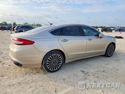 Trzecie zdjęcie samochodu z tyłu: 2017 FORD FUSION SE VIN:3FA6P0H99HR407230 - miniatura