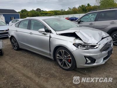 Czwarte zdjęcie samochodu z boku: 2019 FORD FUSION TITANIUM VIN:3FA6P0D94KR153035 - miniatura