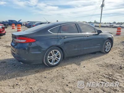 Trzecie zdjęcie samochodu z tyłu: 2018 FORD FUSION SE HYBRID VIN:3FA6P0LUXJR117452 - miniatura