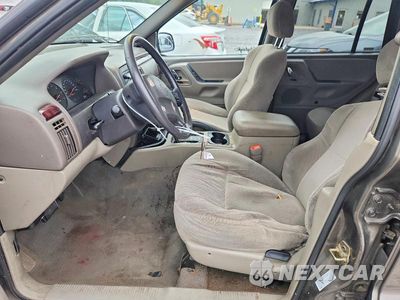 Zdjęcie 7 z 12 samochodu: 2000 JEEP GRAND CHEROKEE LAREDO VIN:1J4GW48S7YC419025 - miniatura