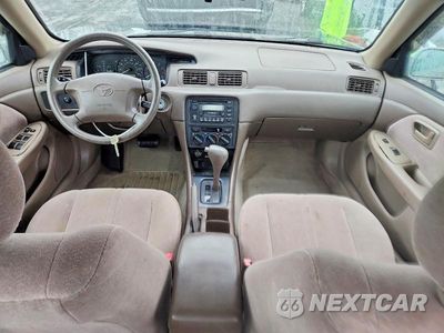 Zdjęcie 8 z 12 samochodu: 1999 TOYOTA CAMRY LE VIN:4T1BG22K9XU583150 - miniatura