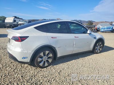 Trzecie zdjęcie samochodu z tyłu: 2021 TESLA MODEL Y VIN:5YJYGAEE1MF212261 - miniatura