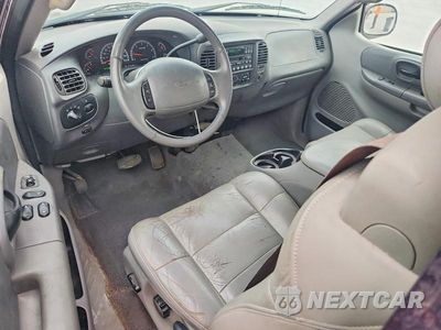 Zdjęcie 8 z 13 samochodu: 2002 FORD F150 VIN:1FTRX17L52NA87313 - miniatura