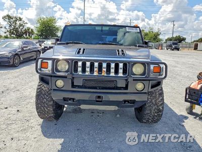 Piąte zdjęcie samochodu w środku: 2005 HUMMER H2 SUT VIN:5GRGN22UX5H101324 - miniatura