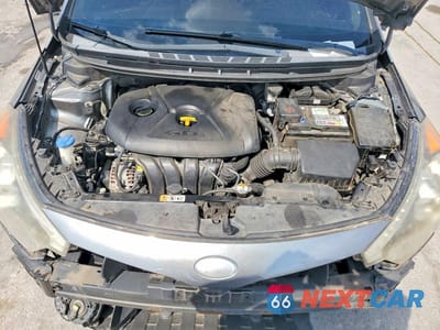 Zdjęcie 11 z 12 samochodu: 2014 KIA FORTE KOUP EX VIN:KNAFX6A87E5172241 - miniatura