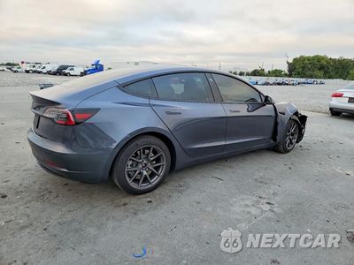 Trzecie zdjęcie samochodu z tyłu: 2021 TESLA MODEL 3 VIN:5YJ3E1EA2MF025897 - miniatura