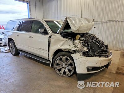 Czwarte zdjęcie samochodu z boku: 2018 CHEVROLET SUBURBAN K1500 PREMIER VIN:1GNSKJKCXJR178826 - miniatura