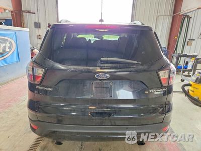 Zdjęcie 6 z 12 samochodu: 2017 FORD ESCAPE TITANIUM VIN:1FMCU9JD7HUC89708 - miniatura