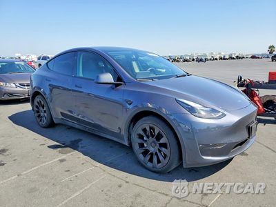 Czwarte zdjęcie samochodu z boku: 2023 TESLA MODEL Y VIN:7SAYGDEE0PF883378 - miniatura