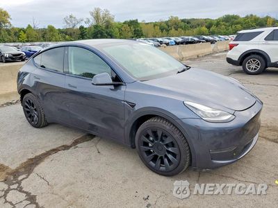 Czwarte zdjęcie samochodu z boku: 2022 TESLA MODEL Y VIN:7SAYGDEE2NA009267 - miniatura