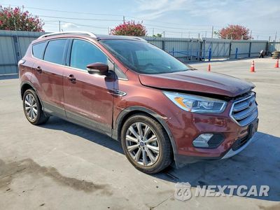 Czwarte zdjęcie samochodu z boku: 2018 FORD ESCAPE TITANIUM VIN:1FMCU0J99JUB16804 - miniatura