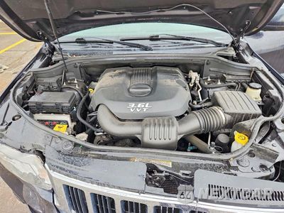 Zdjęcie 11 z 12 samochodu: 2013 JEEP GRAND CHEROKEE LAREDO VIN:1C4RJFAG5DC595208 - miniatura