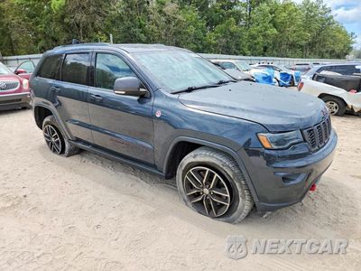 Czwarte zdjęcie samochodu z boku: 2018 JEEP GRAND CHEROKEE TRAILHAWK VIN:1C4RJFLT8JC342440 - miniatura