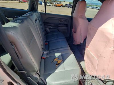 Zdjęcie 10 z 12 samochodu: 2005 HONDA PILOT EXL VIN:2HKYF18595H521705 - miniatura
