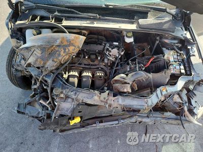 Zdjęcie 11 z 13 samochodu: 2018 FORD FOCUS S VIN:1FADP3E24JL293075 - miniatura
