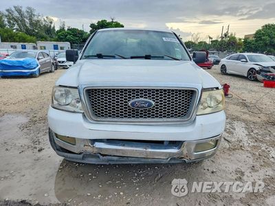 Piąte zdjęcie samochodu w środku: 2004 FORD F150 VIN:1FTPX12554NB50588 - miniatura