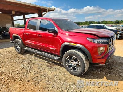 Czwarte zdjęcie samochodu z boku: 2024 GMC CANYON AT4 VIN:1GTP6DEK6R1287592 - miniatura