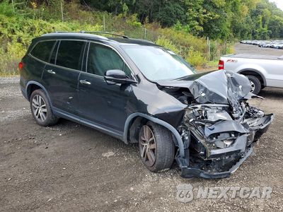Czwarte zdjęcie samochodu z boku: 2017 HONDA PILOT TOURING VIN:5FNYF6H91HB055903 - miniatura