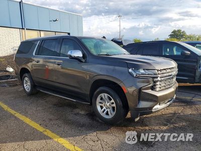 Czwarte zdjęcie samochodu z boku: 2021 CHEVROLET SUBURBAN K1500 PREMIER VIN:1GNSKFKD9MR164443 - miniatura