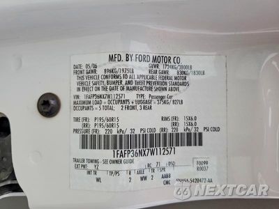 Zdjęcie 13 z 13 samochodu: 2007 FORD FOCUS ZXW VIN:1FAFP36NX7W112571 - miniatura