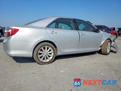 Trzecie zdjęcie samochodu z tyłu: 2012 TOYOTA CAMRY HYBRID XLE VIN:4T1BD1FK8CU042677 - miniatura
