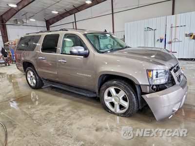 Czwarte zdjęcie samochodu z boku: 2013 CHEVROLET SUBURBAN K1500 LS VIN:1GNSKHE73DR107463 - miniatura