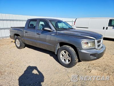Czwarte zdjęcie samochodu z boku: 2011 DODGE DAKOTA SLT VIN:1D7RE3GK3BS534138 - miniatura