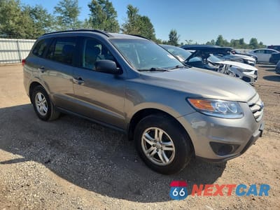Czwarte zdjęcie samochodu z boku: 2012 HYUNDAI SANTA FE GLS VIN:5XYZG4AG8CG147655 - miniatura