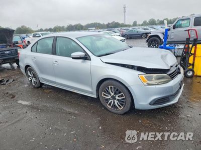 Czwarte zdjęcie samochodu z boku: 2012 VOLKSWAGEN JETTA SE VIN:3VWDX7AJ5CM347870 - miniatura