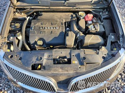 Zdjęcie 11 z 12 samochodu: 2015 LINCOLN MKS VIN:1LNHL9DK6FG604951 - miniatura