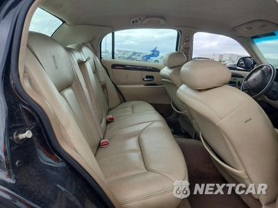 Zdjęcie 10 z 12 samochodu: 1999 LINCOLN TOWN CAR CARTIER VIN:1LNHM83W5XY621098 - miniatura