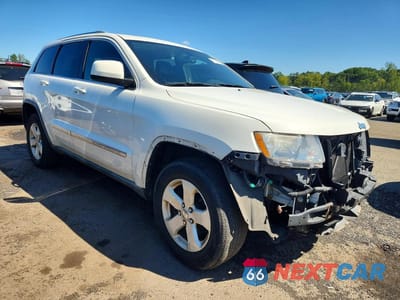 Czwarte zdjęcie samochodu z boku: 2011 JEEP GRAND CHEROKEE LAREDO VIN:1J4RR4GG2BC714716 - miniatura