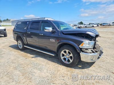 Czwarte zdjęcie samochodu z boku: 2015 RAM 1500 LARAMIE VIN:1C6RR7NM9FS680339 - miniatura