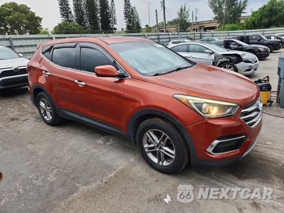 Czwarte zdjęcie samochodu z boku: 2017 HYUNDAI SANTA FE SPORT 2.4L VIN:5XYZT3LB0HG479930 - miniatura