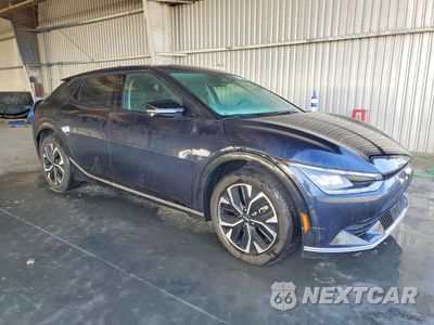 Czwarte zdjęcie samochodu z boku: 2023 KIA EV6 WIND VIN:KNDC34LAXP5602580 - miniatura