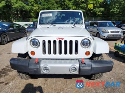 Piąte zdjęcie samochodu w środku: 2011 JEEP WRANGLER UNLIMITED SAHARA VIN:1J4BA5H19BL563480 - miniatura