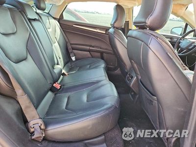 Zdjęcie 10 z 12 samochodu: 2019 FORD FUSION TITANIUM VIN:3FA6P0K91KR253113 - miniatura