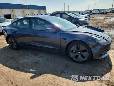 Czwarte zdjęcie samochodu z boku: 2023 TESLA MODEL 3 VIN:5YJ3E1EA6PF583496 - miniatura