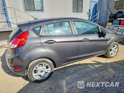 Trzecie zdjęcie samochodu z tyłu: 2015 FORD FIESTA SE VIN:3FADP4EJ3FM159029 - miniatura