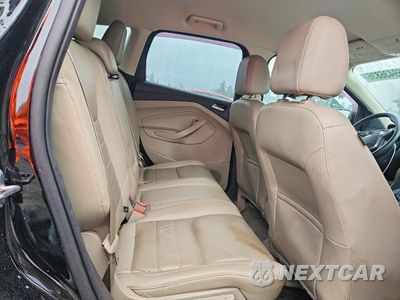 Zdjęcie 11 z 13 samochodu: 2016 FORD ESCAPE TITANIUM VIN:1FMCU9JX3GUA07802 - miniatura