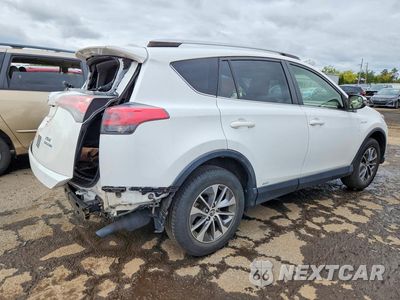 Trzecie zdjęcie samochodu z tyłu: 2016 TOYOTA RAV4 HV XLE VIN:JTMRJREV9GD057927 - miniatura