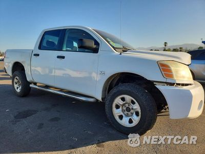 Czwarte zdjęcie samochodu z boku: 2004 NISSAN TITAN XE VIN:1N6AA07B84N533681 - miniatura