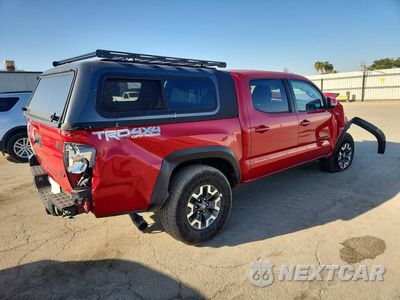 Trzecie zdjęcie samochodu z tyłu: 2023 TOYOTA TACOMA TRD OFF-ROAD VIN:3TMCZ5AN7PM568571 - miniatura