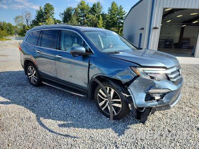 Czwarte zdjęcie samochodu z boku: 2016 HONDA PILOT TOURING VIN:5FNYF6H94GB026815 - miniatura