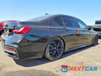 Trzecie zdjęcie samochodu z tyłu: 2020 BMW 740 I VIN:WBA7T2C04LGL17544 - miniatura