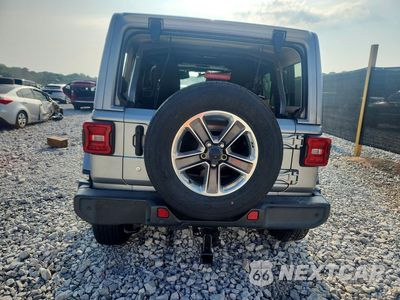 Zdjęcie 6 z 13 samochodu: 2018 JEEP WRANGLER UNLIMITED SAHARA VIN:1C4HJXEN3JW326872 - miniatura