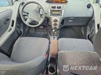 Zdjęcie 8 z 12 samochodu: 2009 TOYOTA YARIS BASE VIN:JTDKT903X95249100 - miniatura
