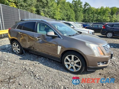 Czwarte zdjęcie samochodu z boku: 2014 CADILLAC SRX PREMIUM COLLECTION VIN:3GYFNGE38ES586299 - miniatura