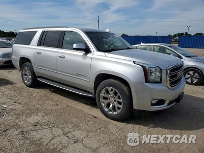 Czwarte zdjęcie samochodu z boku: 2019 GMC YUKON XL K1500 SLT VIN:1GKS2GKC7KR100439 - miniatura