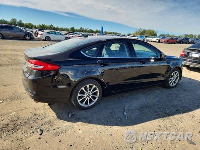 Trzecie zdjęcie samochodu z tyłu: 2017 FORD FUSION SE HYBRID VIN:3FA6P0LU3HR300332 - miniatura
